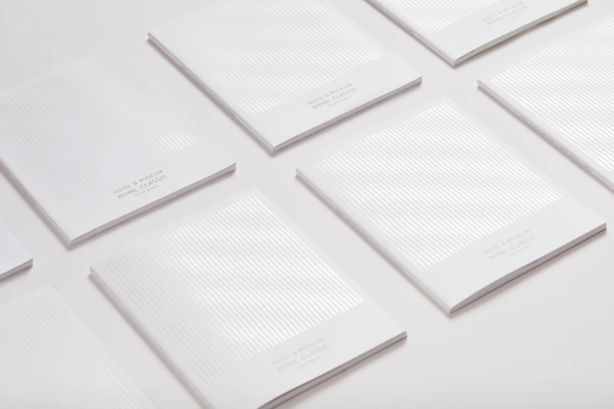 Royal Classic Hotel Osaka white embossed stationery arranged on a light background