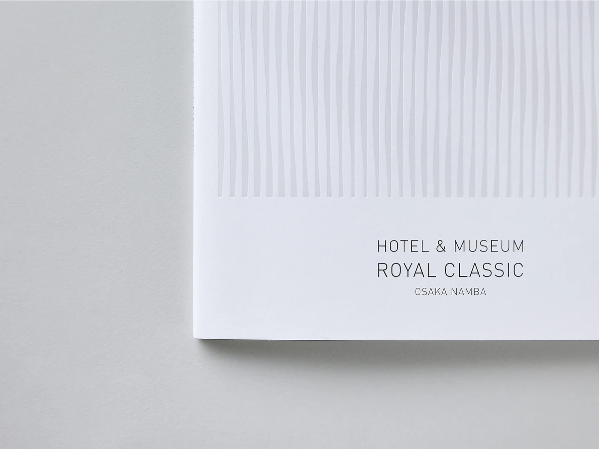 Close photograph of embossed lines and printed lettering on Royal Classic Hotel stationery